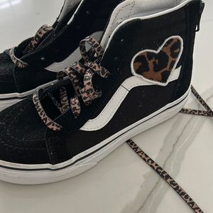 Vans girl high tops faux fur sneakers. Never worn brand new.